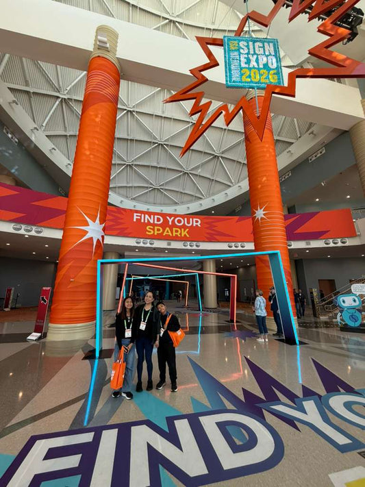 iHeartCustoms team attending ISA 2026 sign expo in Orlando exploring custom signs and large format printing solutions