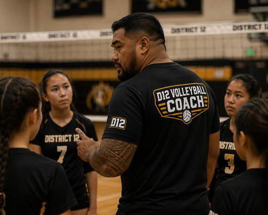 District 12 custom volleyball team apparel produced by iHeartCustoms Orlando — player practice jerseys, coach uniforms with Sport-Tek Tall options, and team merchandise under a coordinated team identity