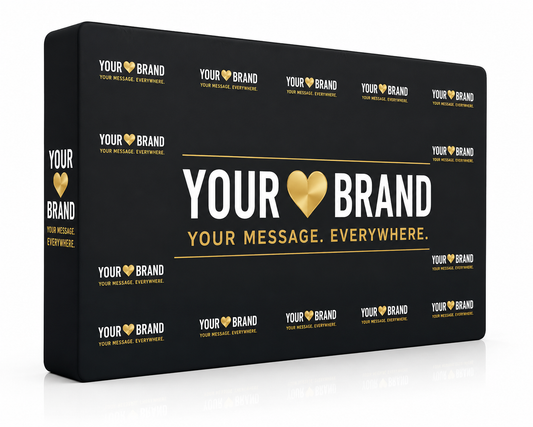 A black rectangular product box shown at a slight angle on a white background, with repeated gold and white 'YOUR BRAND' text and a large central 'YOUR BRAND' logo featuring a gold heart.