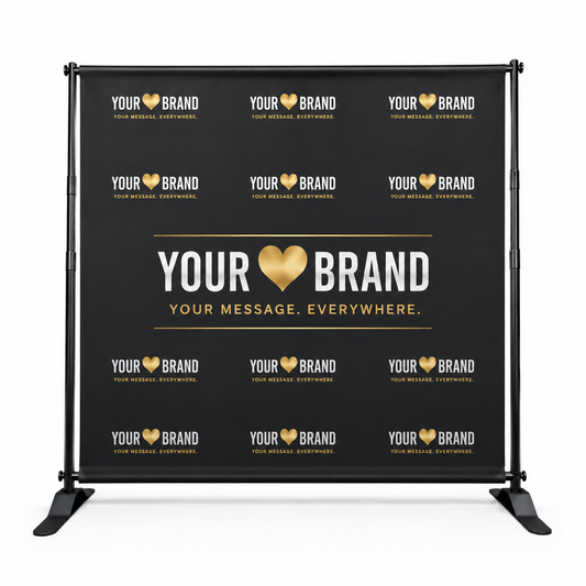 A black freestanding banner stand with a custom printed backdrop featuring a repeating 'YOUR BRAND' logo pattern in white and gold, with the central text 'YOUR BRAND' and 'YOUR MESSAGE. EVERYWHERE.